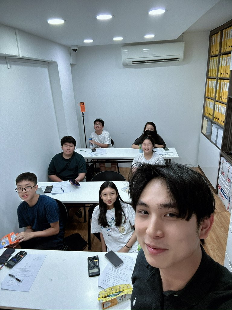 Teacher Shawen with his Maths class at Learn Beyond Education